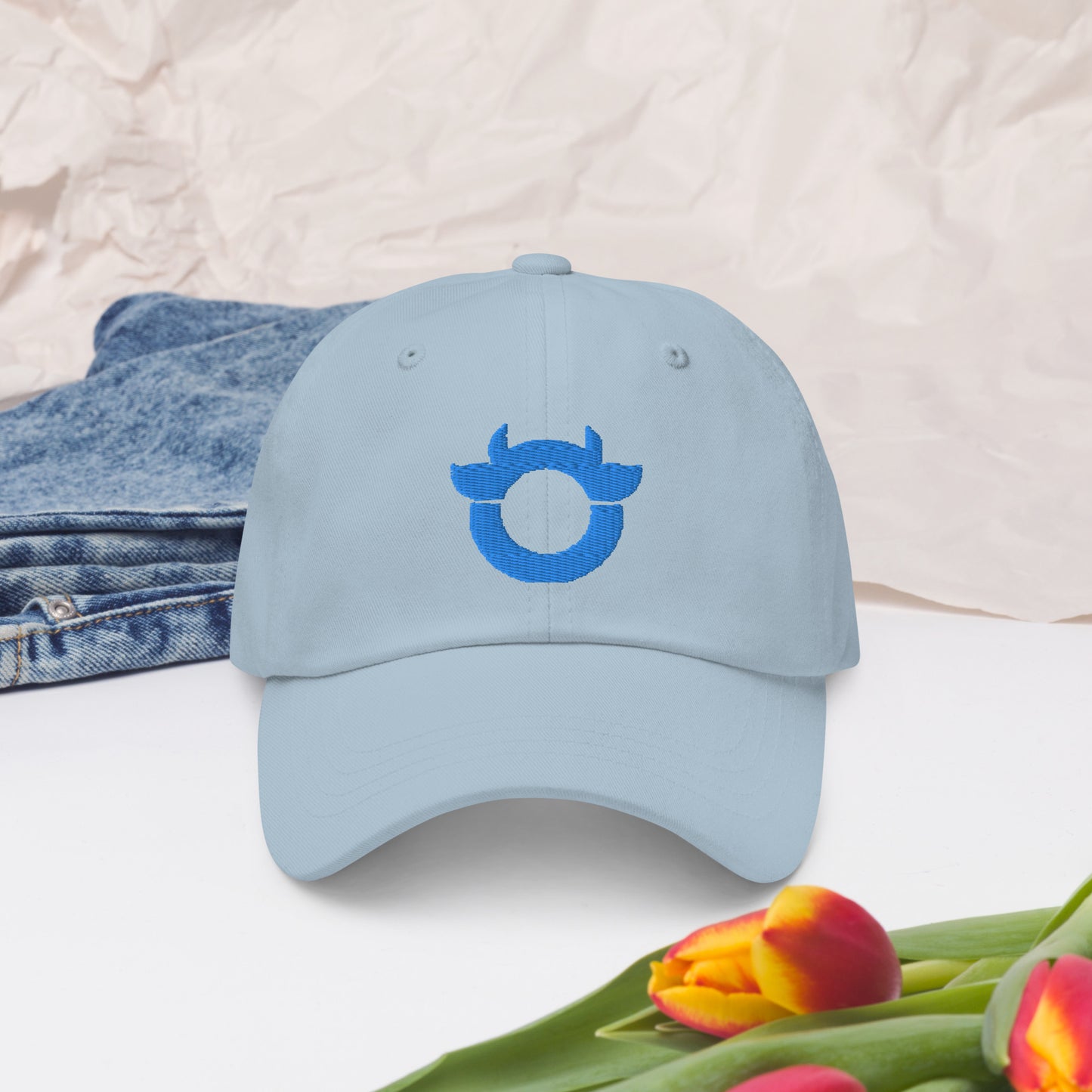 The original Nasty Cow cap with a light blue embroidered logo.